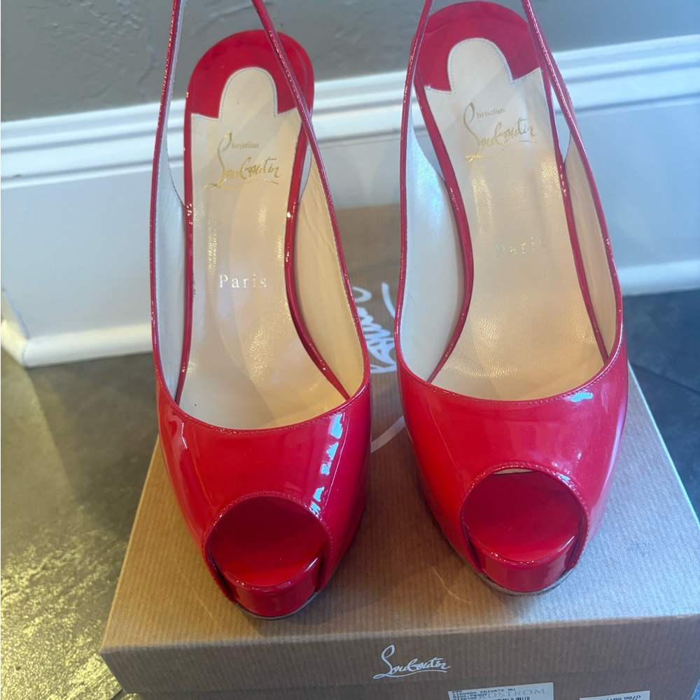 Christian Louboutin Women’s peep toe pumps